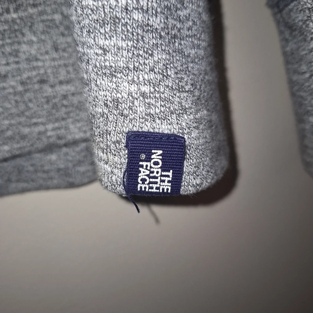A The North Face men's cotton sweatshirt in a size large. Pre-loved